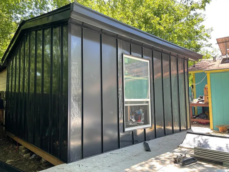 Black standing seam metal wall panels for Roof Inspection in Wade Hampton